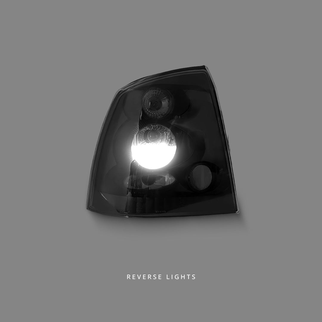 Holden Astra TS (1998 - 2004) Black Altezza Tail Lights LH + RH