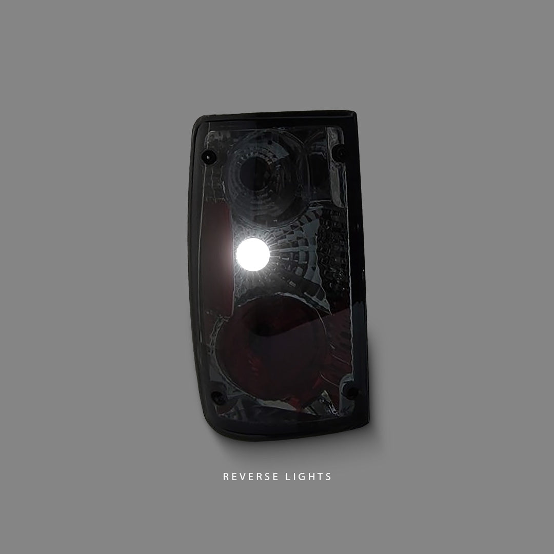 Toyota HiLux N50 (1989 - 1997) Smoke Altezza Black Tail Lights LH + RH