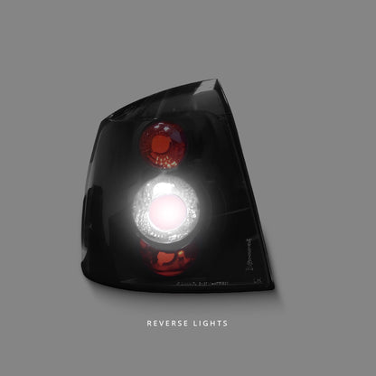 Holden Astra TS (1998 - 2004) Black Altezza Tail Lights LH + RH