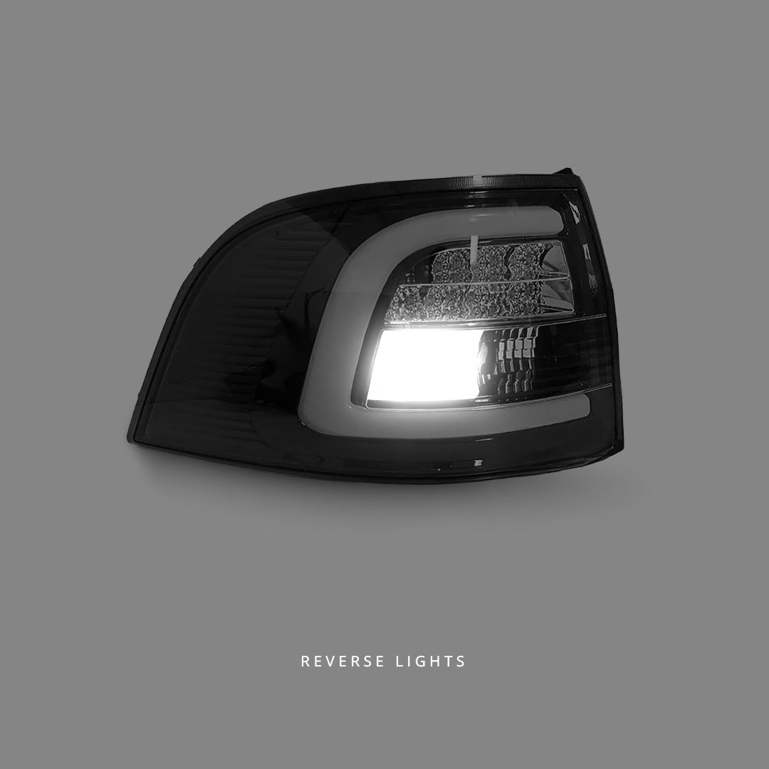 Holden Commodore VE / VF (2008 - 2016) 3D Light Bar Black LED Tail Lights LH + RH
