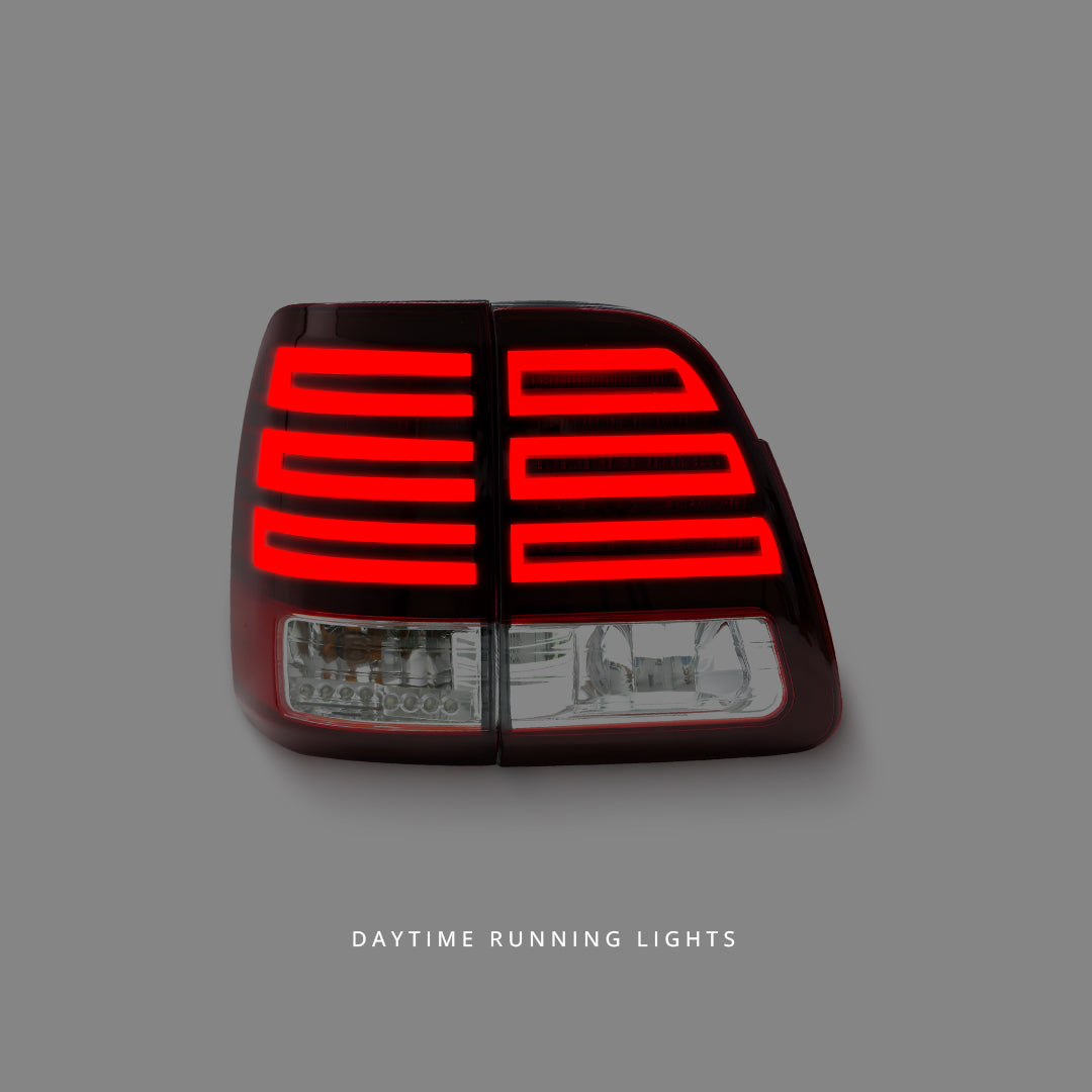 Toyota LandCruiser 100 Series (1998 - 2007) Clear Red LED Tail Lights LH + RH