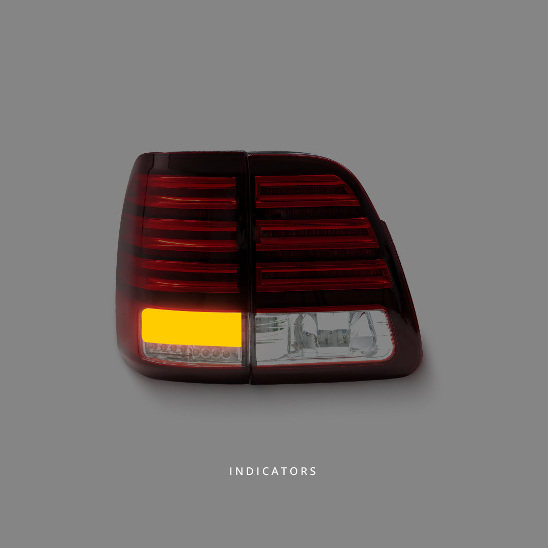 Toyota LandCruiser 100 Series (1998 - 2007) Clear Red LED Tail Lights LH + RH