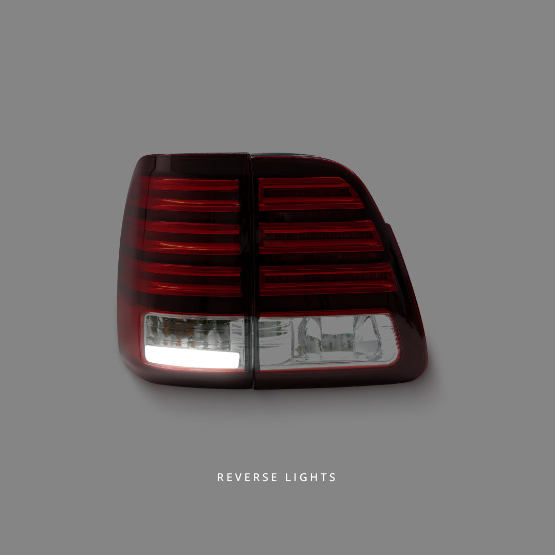 Toyota LandCruiser 100 Series (1998 - 2007) Clear Red LED Tail Lights LH + RH