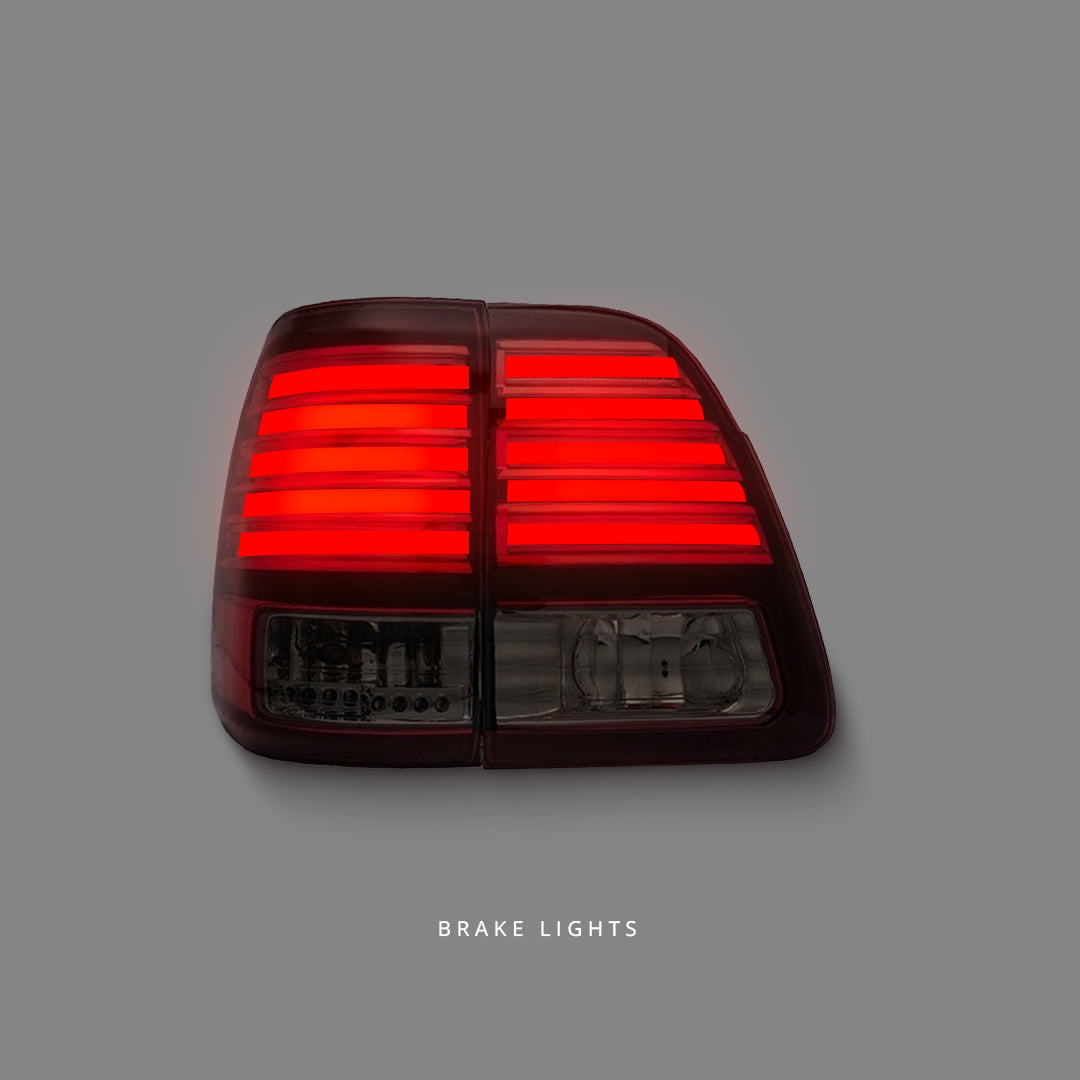 Toyota LandCruiser 100 Series (1998 - 2007) Smoked Red LED Tail Lights LH + RH