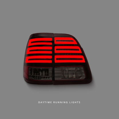Toyota LandCruiser 100 Series (1998 - 2007) Smoked Red LED Tail Lights LH + RH
