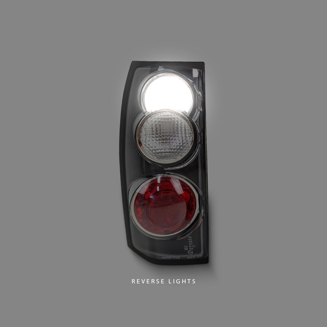 Holden Commodore VT / VX / VU / VY / VZ (1997 - 2007) Black Altezza Tail Light LH + RH